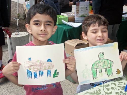 two-boys-display-frog-drawings