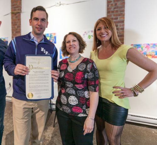 Mayor Steven Fulop, Susan Newman and Kristin DeAngelis with proclamation for Frogs Are Green's Green Dream International Children's Earth Day Exhibition at The Distillery Gallery. Photo by Danny Chong.