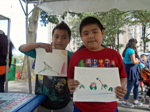 Boys creating frog art at Washington Park Live