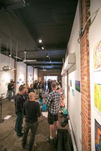 Crowd at The Distillery Gallery for the Green Dream - Save the Frogs Day event in Jersey City. Photo by Danny Chong.