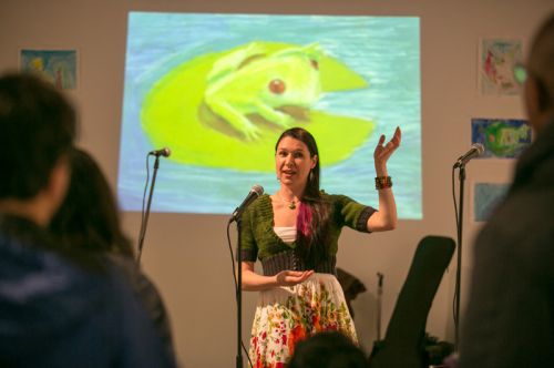 Michelle Luebke, environmentalist and instructor at CUNY, guest speaker, talking about frogs at the Green Dream - Save The Frogs Day event, The Distillery Gallery in Jersey City. Photo by Danny Chong.