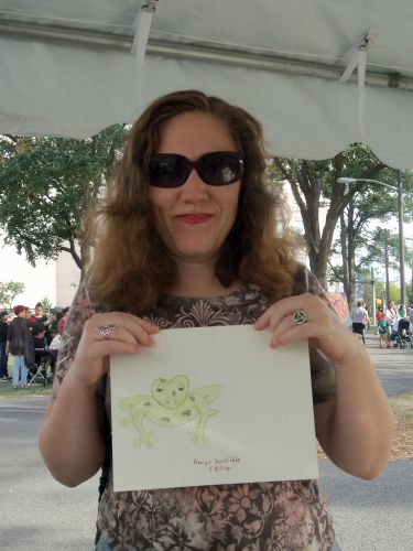 Amy Neufeld draws a frog at Washington Park Live
