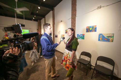 Mayor Steven Fulop interviews Michelle Luebke on frog decline and the environment for JC1TV at Frogs Are Green's Green Dream - Save the Frogs Day event at The Distillery Gallery. Photo by Danny Chong.
