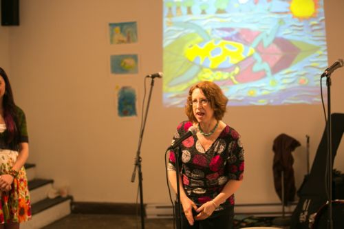 Susan Newman, founder of Frogs Are Green speaking to the crowd at the Green Dream - Save The Frogs Day event, The Distillery Gallery in Jersey City. Photo by Danny Chong.