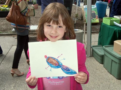 child-draws-tadpole-art