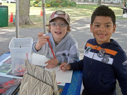 Two boys enjoy drawing frogs at WPLIVE