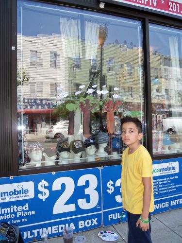 Gerald-Vargas-paints-trees-490-Central-Ave