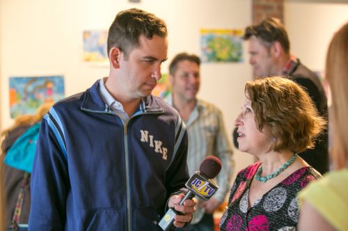 Mayor Steven Fulop and Frogs Are Green founder Susan Newman discuss frog decline and the Green Dream - Save The Frogs Day event at The Distillery Gallery in Jersey City. Photo by Danny Chong.