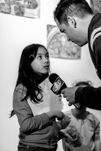 Mayor Fulop interviews one of the children at Frogs Are Green's Green Dream - Save The Frogs Day event at The Distillery Gallery. Photo by Danny Chong.