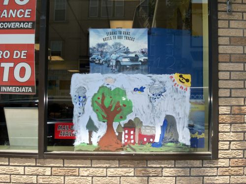 Smily-Diaz-PS8-window-city-of-trees-261-central-ave