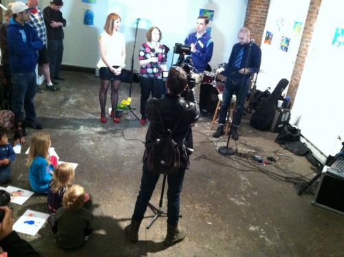 Jersey City 1 TV films, Frogs Are Green founder Susan Newman and Mayor Steven Fulop with Distillery Gallery curators