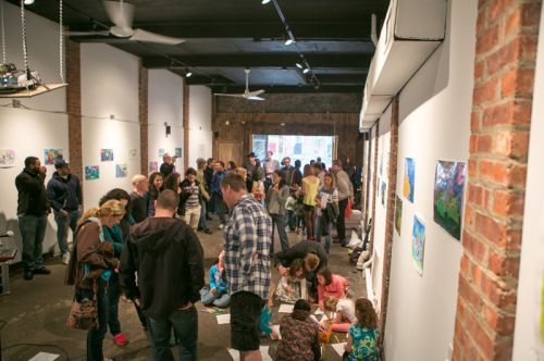 Crowded gathering at Green Dream's Save the Frogs Day event at The Distillery Gallery in Jersey City. Hosted by Frogs Are Green. Photo by Danny Chong.