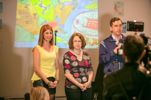 JC1TV reporter films Frogs Are Green's Green Dream - Save the Frogs Day event with Mayor Fulop at The Distillery Gallery. Photo by Danny Chong.