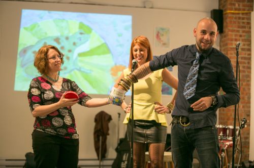 Selecting the raffle contest winner at the Green Dream - Save The Frogs Day event, The Distillery Gallery in Jersey City. One child won free Saturday morning art classes for a year! Photo by Danny Chong.