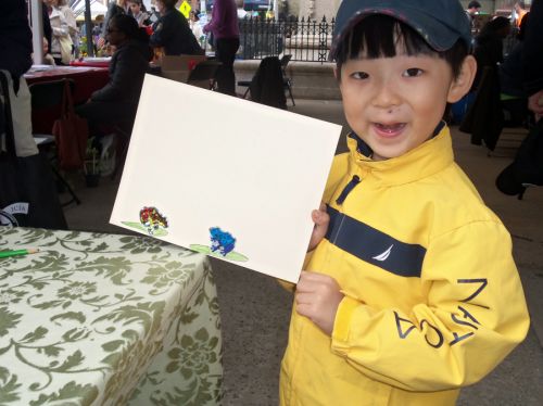 young-boy-frogs-lily-pads