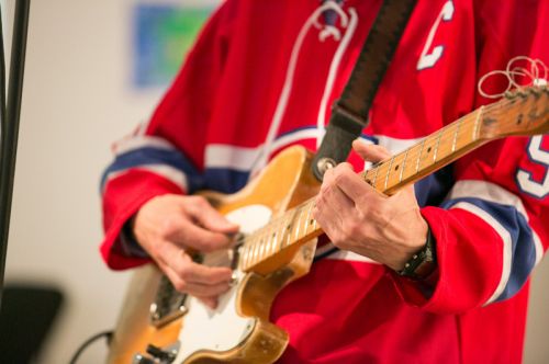 Dave Case playing guitar with The Gully Hubbards at Frogs Are Green's Green Dream - Save the Frogs Day event at The Distillery Gallery in Jersey City. Photo by Danny Chong.