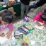 children-work-hard-on-frog-drawings thumbnail