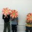 3-lion-masks-with-boys-at-peaceful-frogs-class-hoboken thumbnail