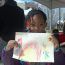 young-girl-with-rainbow-art thumbnail