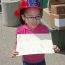 Young-girl-with-her-frog-drawing thumbnail